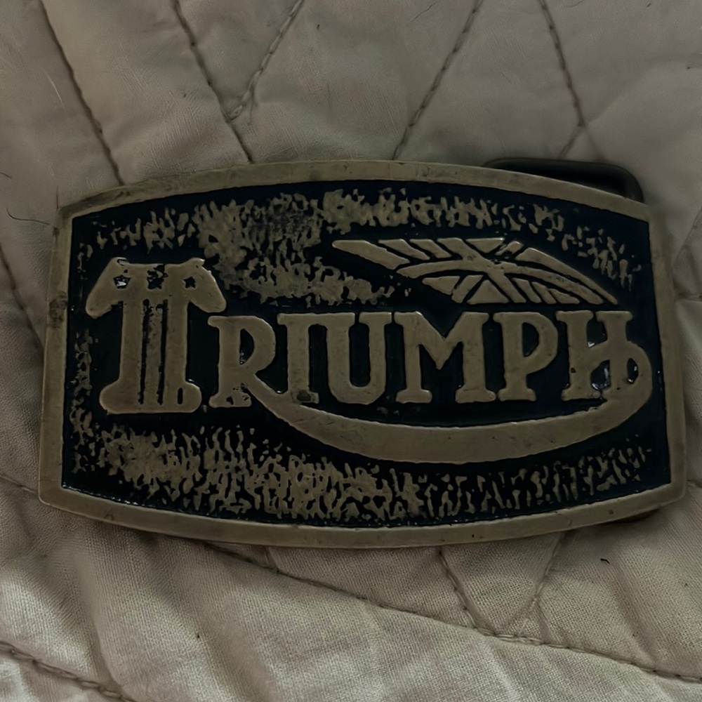 Triumph belt buckle.
